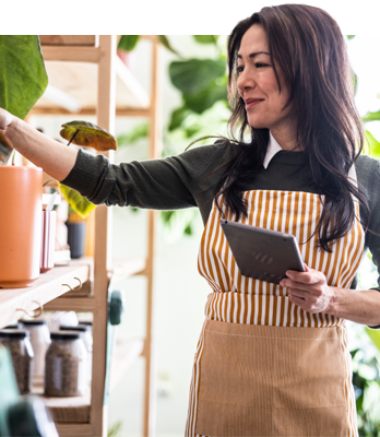 Lifestyle. Person checking on plant inventory.