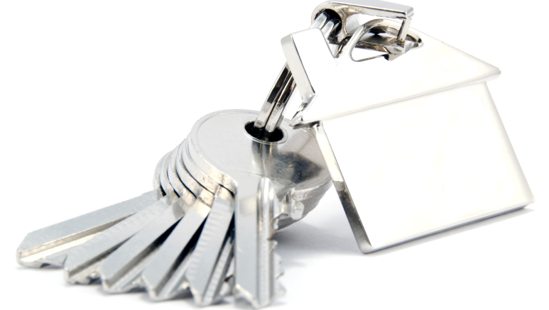 Set of keys on a house-shaped keychain