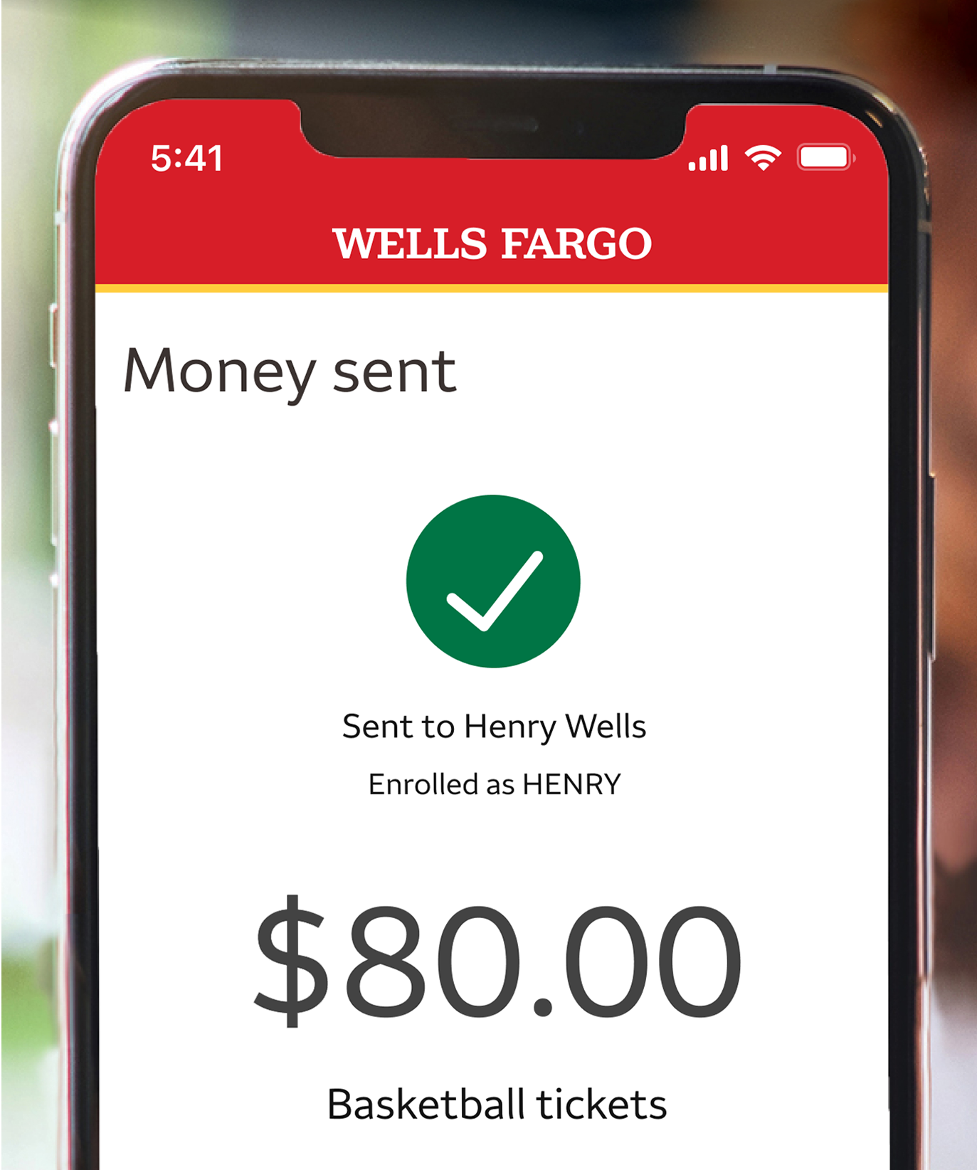 Close-up of phone with the Zelle payment page on its screen.