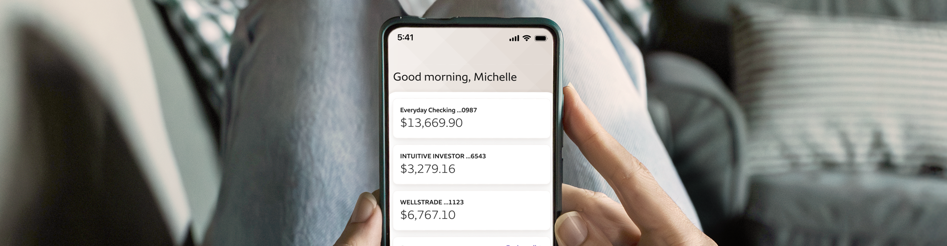 Product showcase. Smartphone displaying the Wells Fargo Mobile app home screen.
