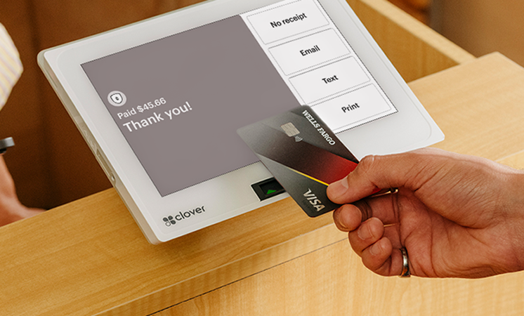 Lifestyle. Customer at checkout counter with cashier.