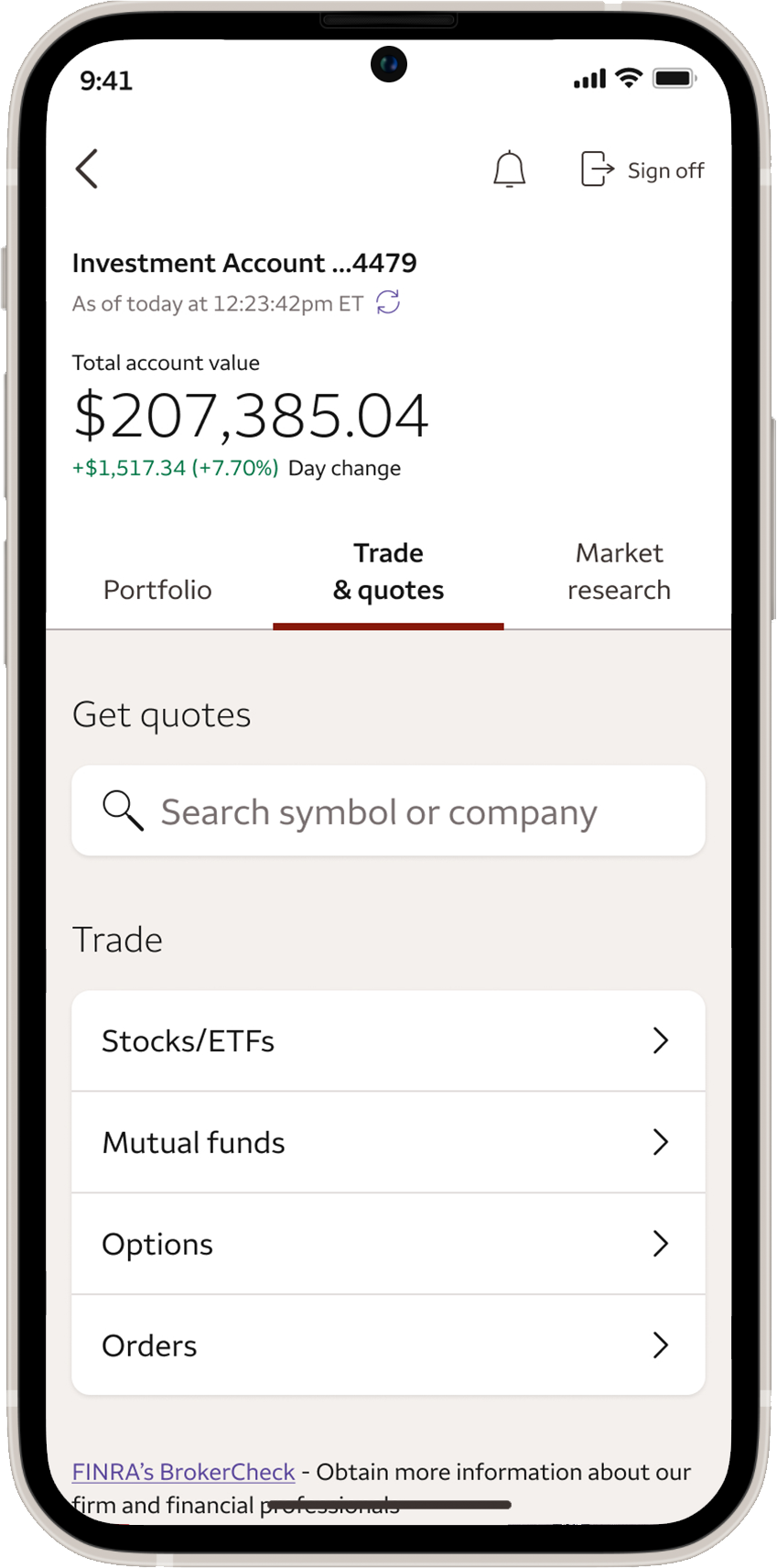 Mobile phone showing the Wells Fargo Mobile app Account screen in Trade quotes tab